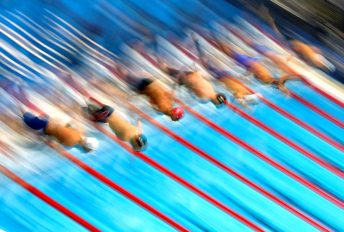 Swimmers compete at the 2020 Summer Olympics in Tokyo.